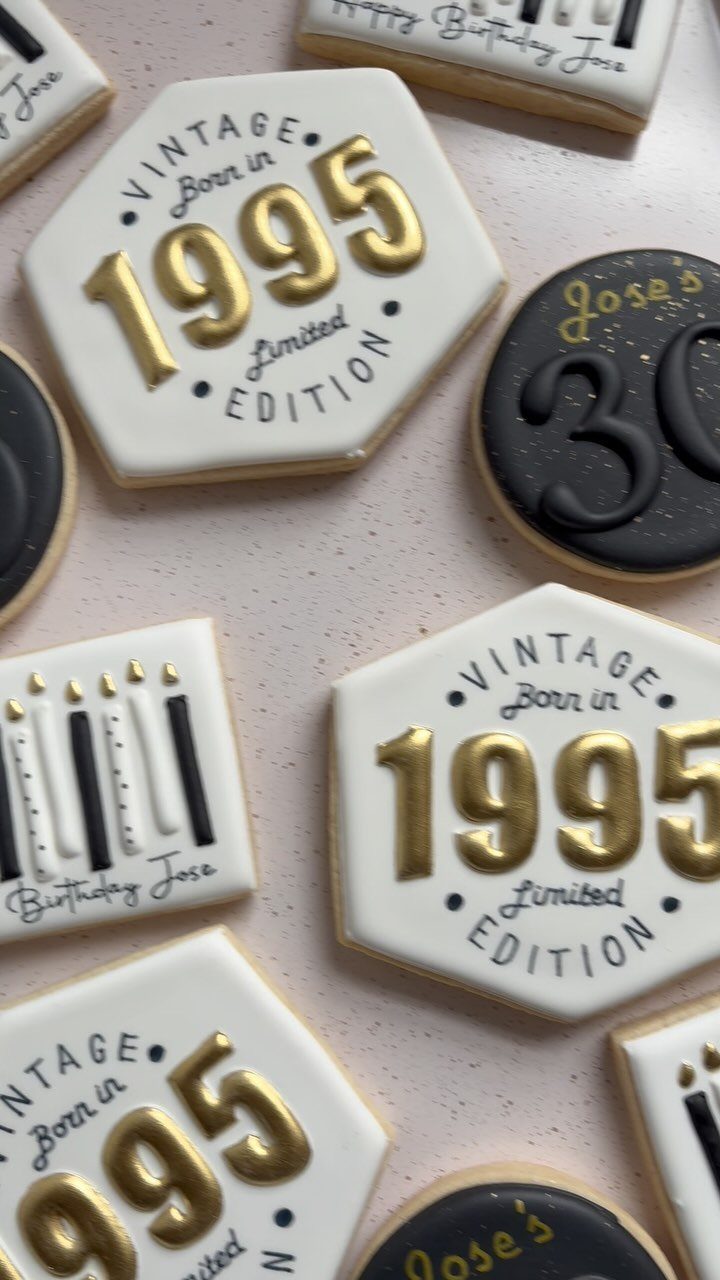 Decorated birthday cookies featuring gold 1995 text and black icing with number 30.