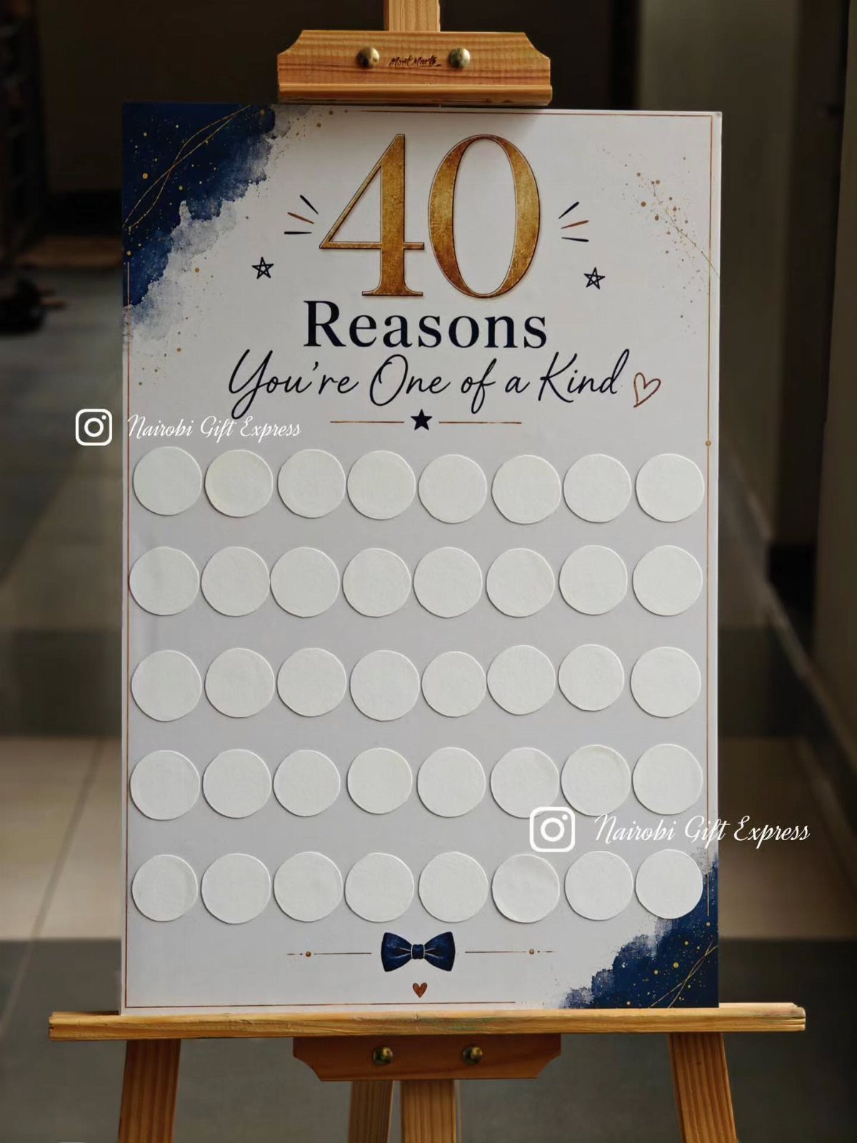 A 40th birthday memory board on a wooden easel with blank circular tags.