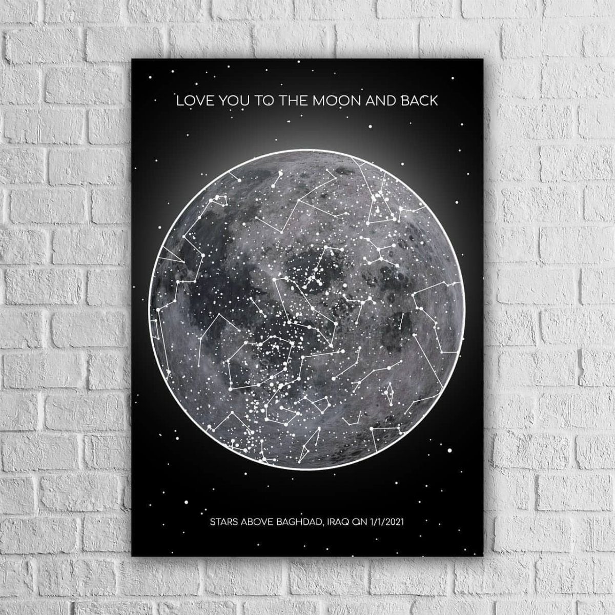 Personalized star map poster with a moon and constellations on a white brick wall