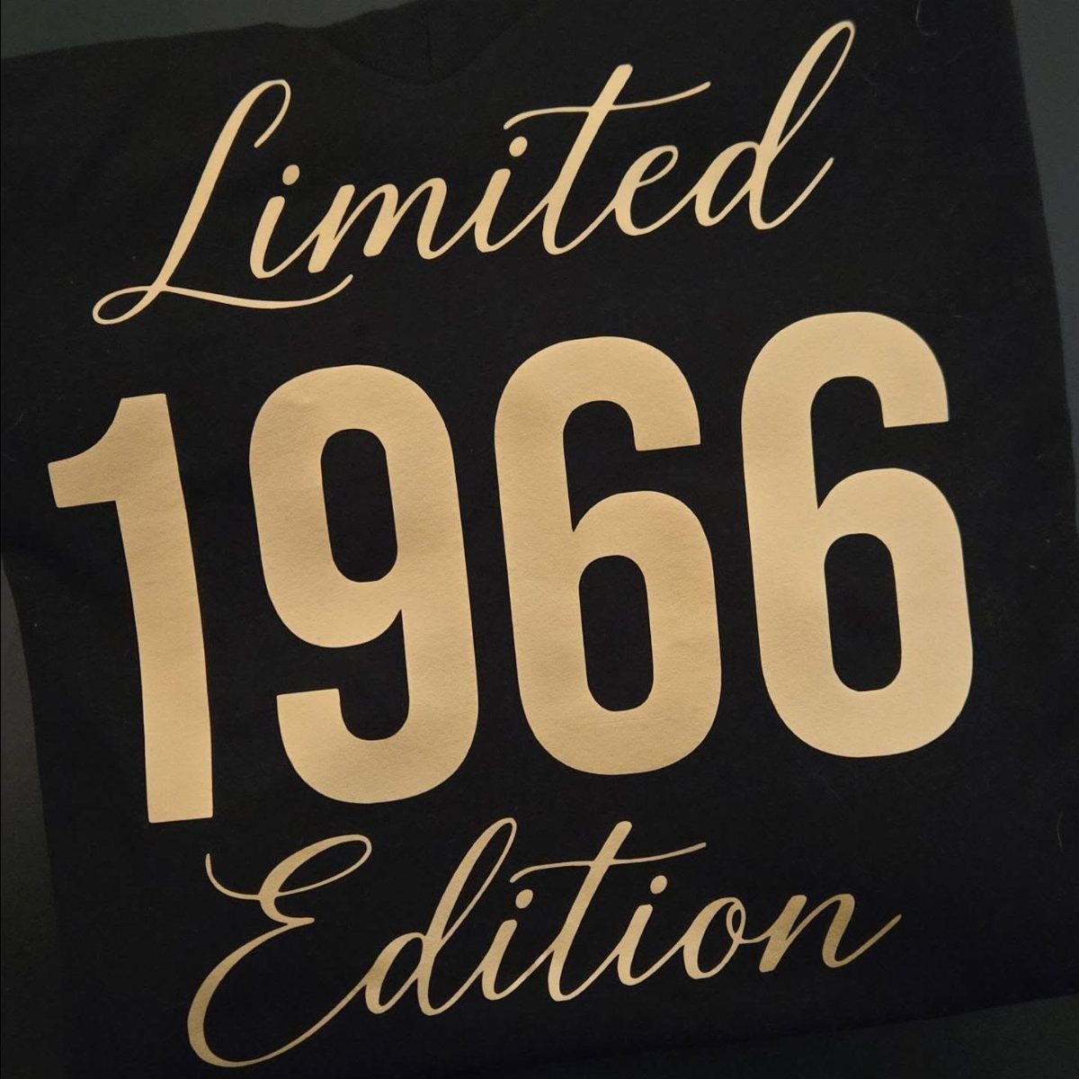Black t-shirt with gold text reading Limited 1966 Edition for a birthday.