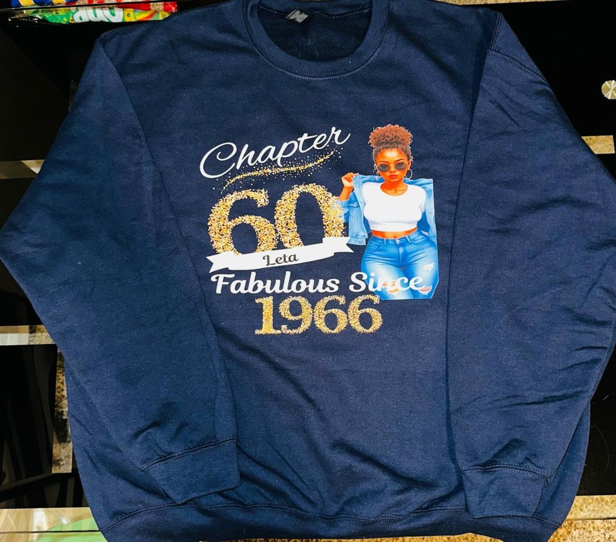 Navy blue sweatshirt with 60th birthday graphic and the name Leta printed on it.