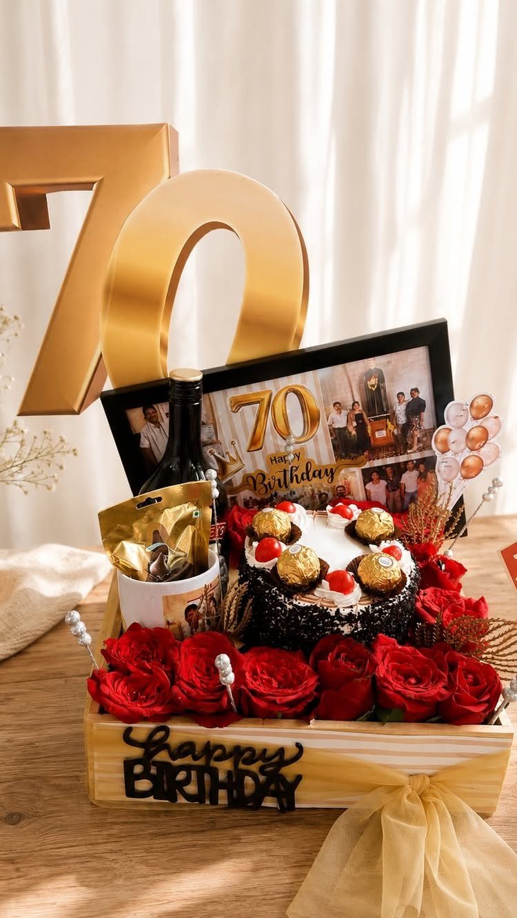 Birthday gift box for a 70th birthday with cake, roses, wine, and gold numbers.