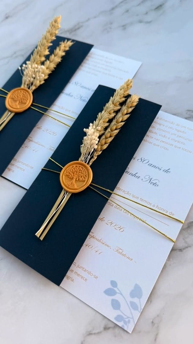 Navy blue and white 80th birthday invitations with gold wax seals and wheat stalks