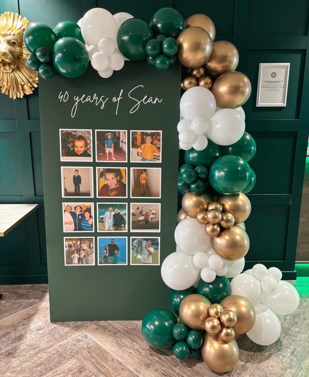 Photo timeline display with a grid of pictures and green and gold balloons.