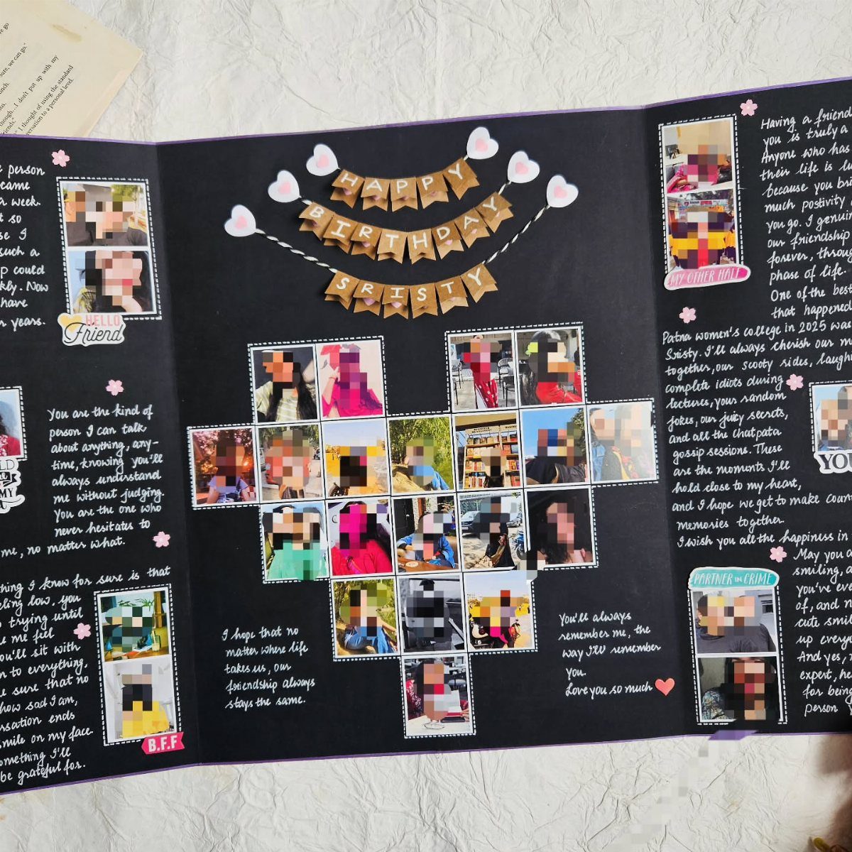 Handmade black scrapbook with photos and a Happy Birthday banner for Kristy.