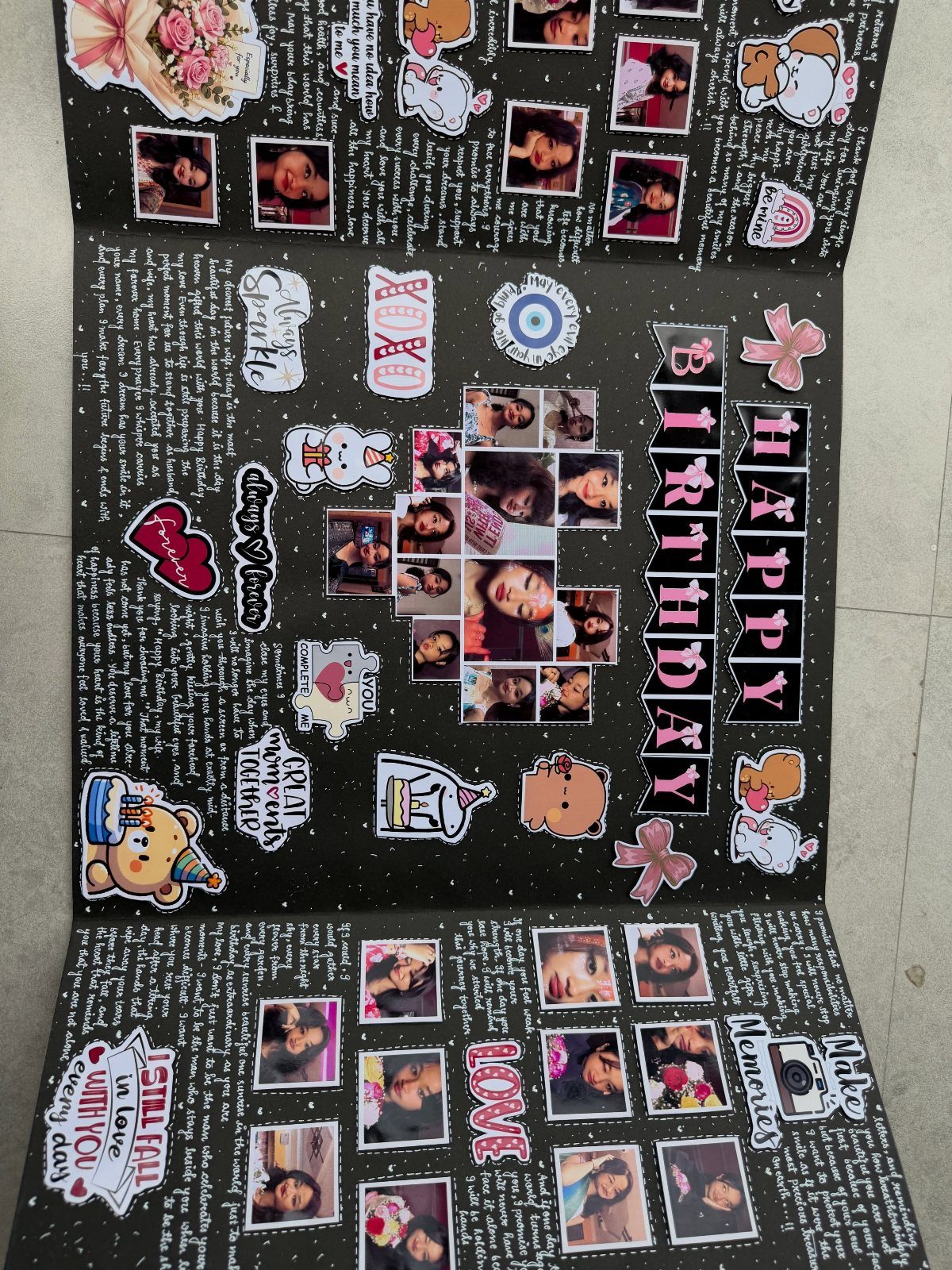 Open black scrapbook with photos, handwritten notes, and Happy Birthday lettering.