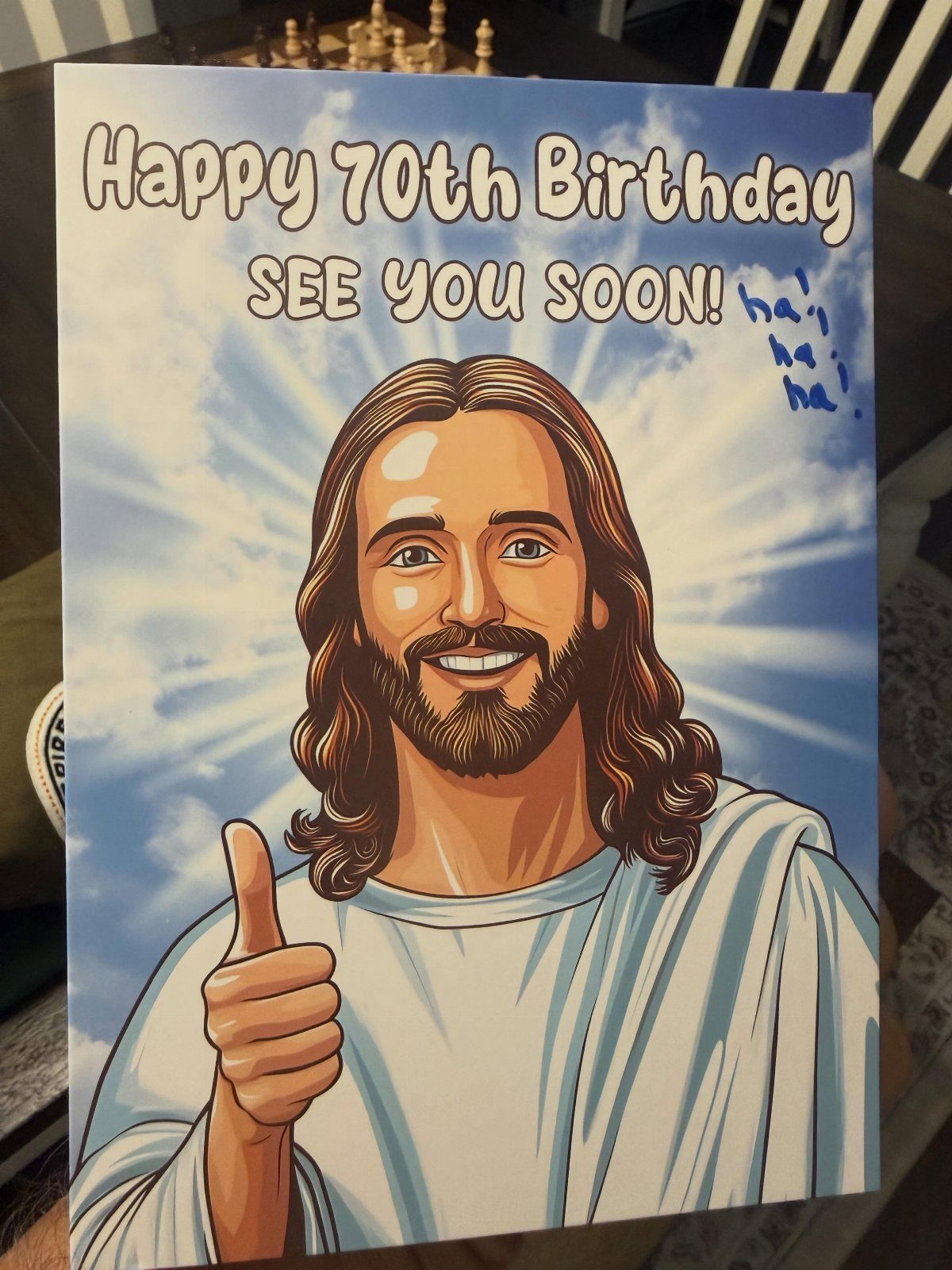 Birthday card with Jesus giving a thumbs up and humorous text for 70th birthday.