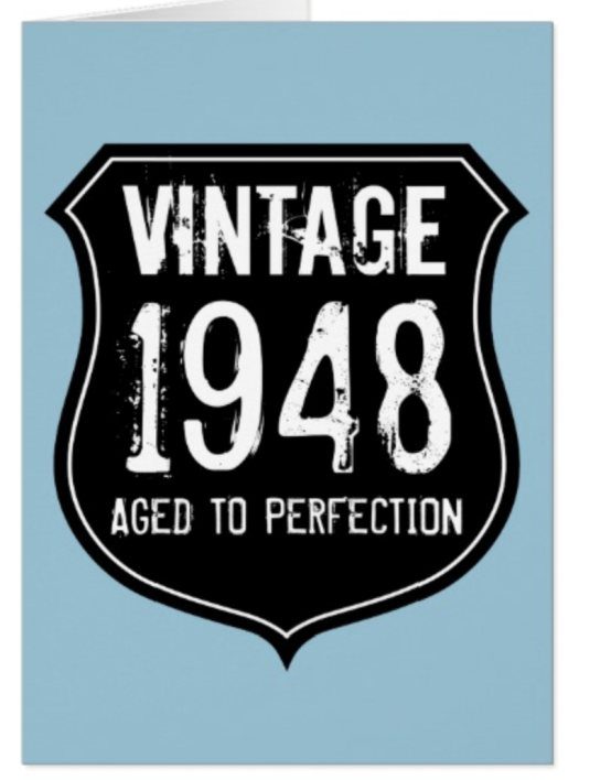 Light blue birthday card with a black vintage 1948 shield emblem.