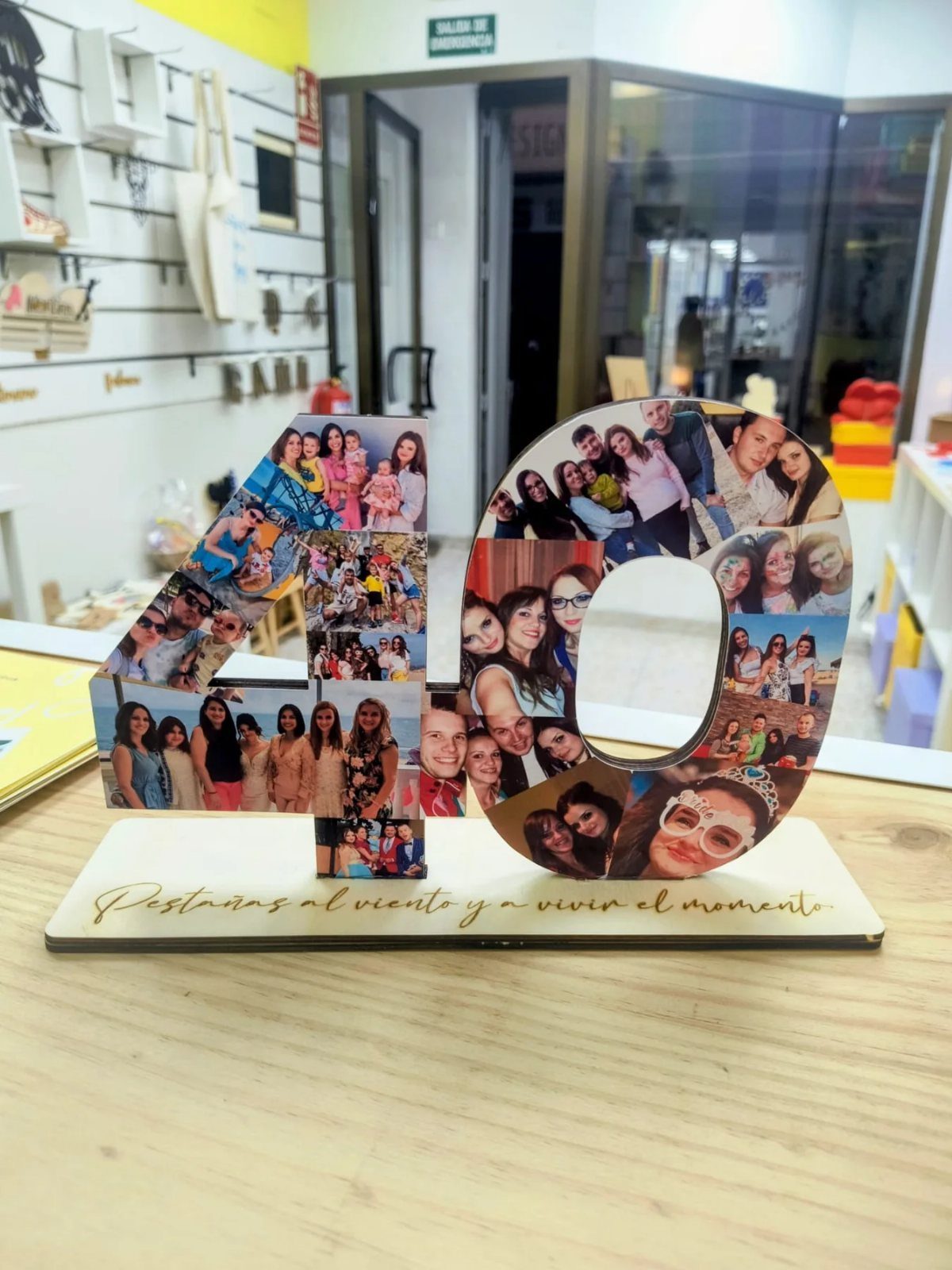 Wooden number 40 collage featuring personal photographs on a light wood base.