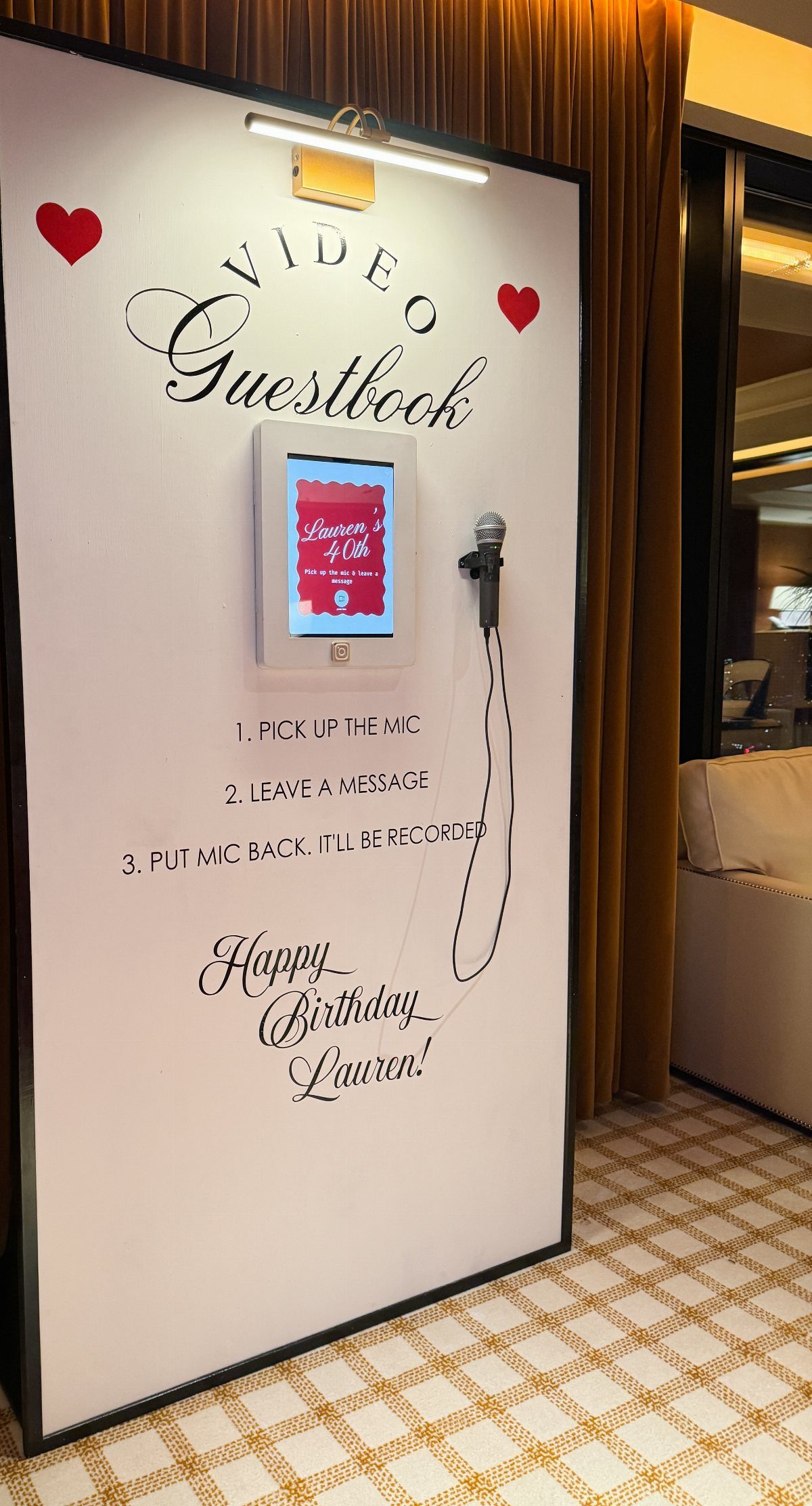 Video guestbook station for Lauren's birthday with a microphone and digital screen.