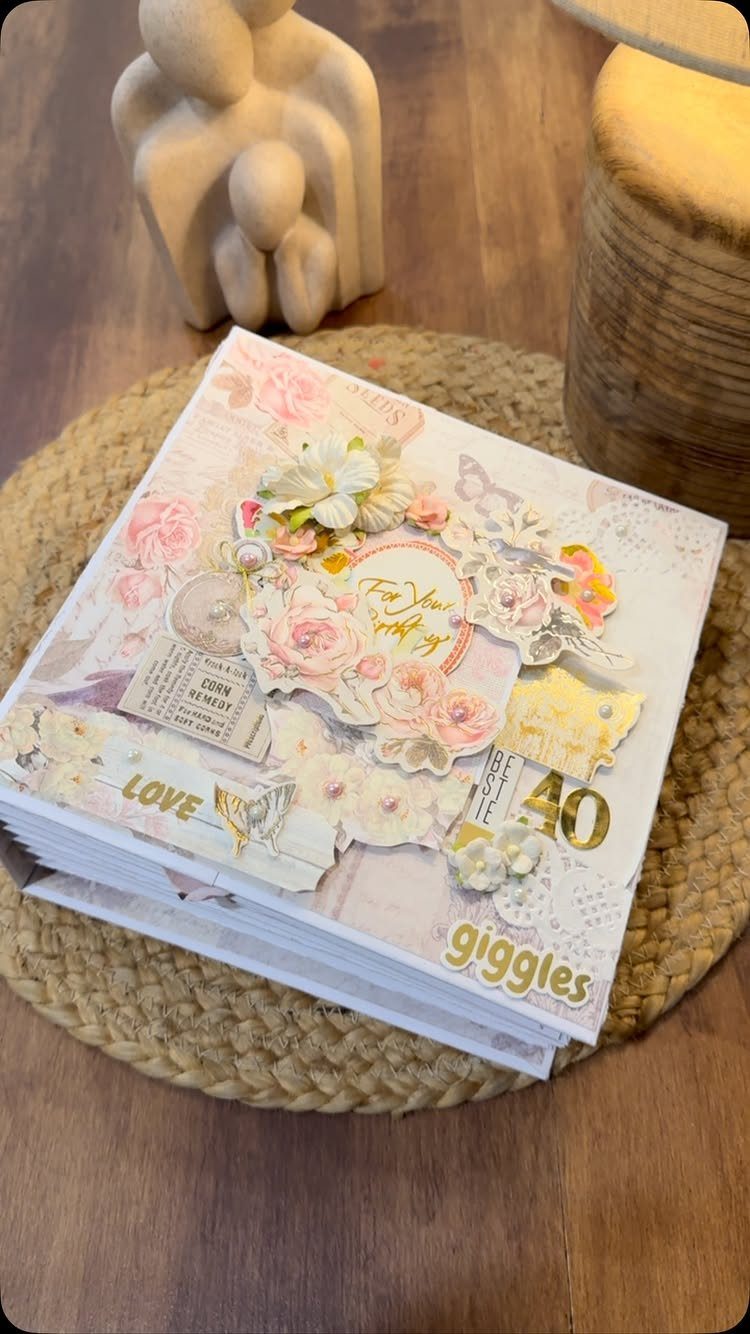 Handmade scrapbook for a 40th birthday with floral decorations and sentimental words.